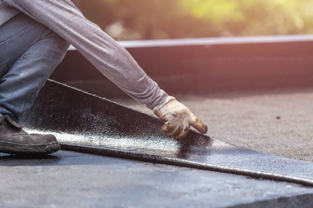 Professional Basement Waterproofing technician working in Heath, OH